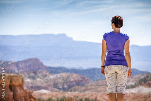 Tourist admiring nature in Bryce Canyon National Park