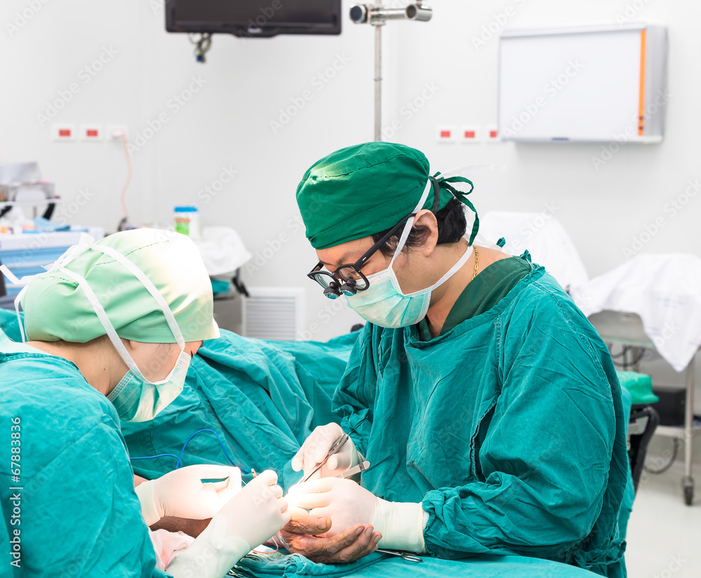 surgeon operating arteriovenous fistula for long term dialysis w surgeon operating arteriovenous fistula for long term dialysis w