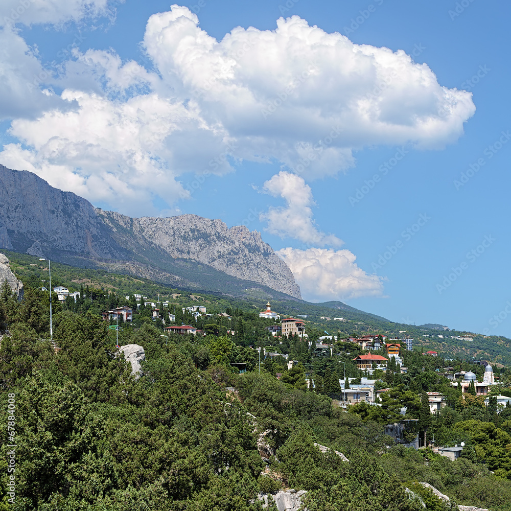 Simeiz settlement and clouds over the mountain Ai-Petri in Crime Simeiz settlement and clouds over the mountain Ai-Petri in Crime
