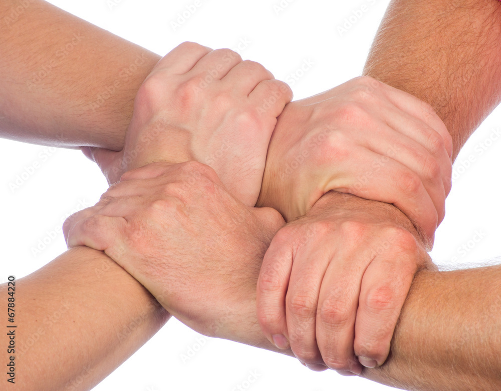 Hand coordination ,Multiracial hands holding each other in unity Hand coordination ,Multiracial hands holding each other in unity