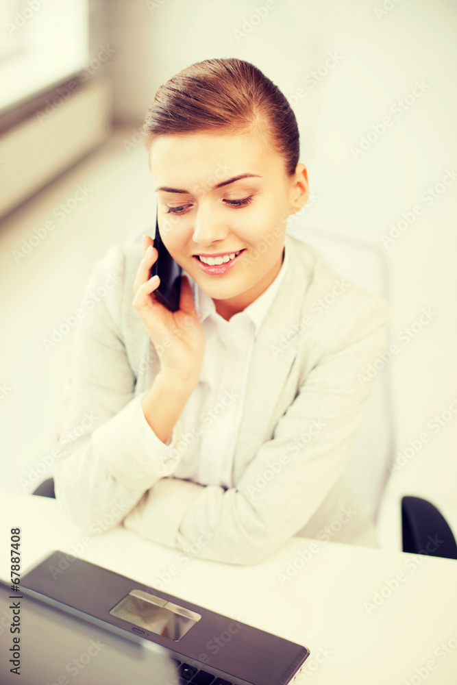 businesswoman with smartphone in office businesswoman with smartphone in office