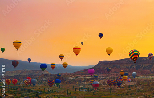 Hot air balloon landscape Hot air balloon flying mountain valley Göreme National Park and the Rocks Sites of Cappadocia Turkey