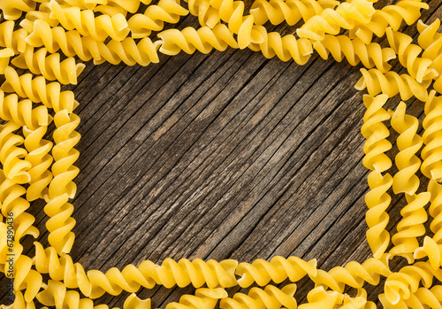 Pasta wooden background