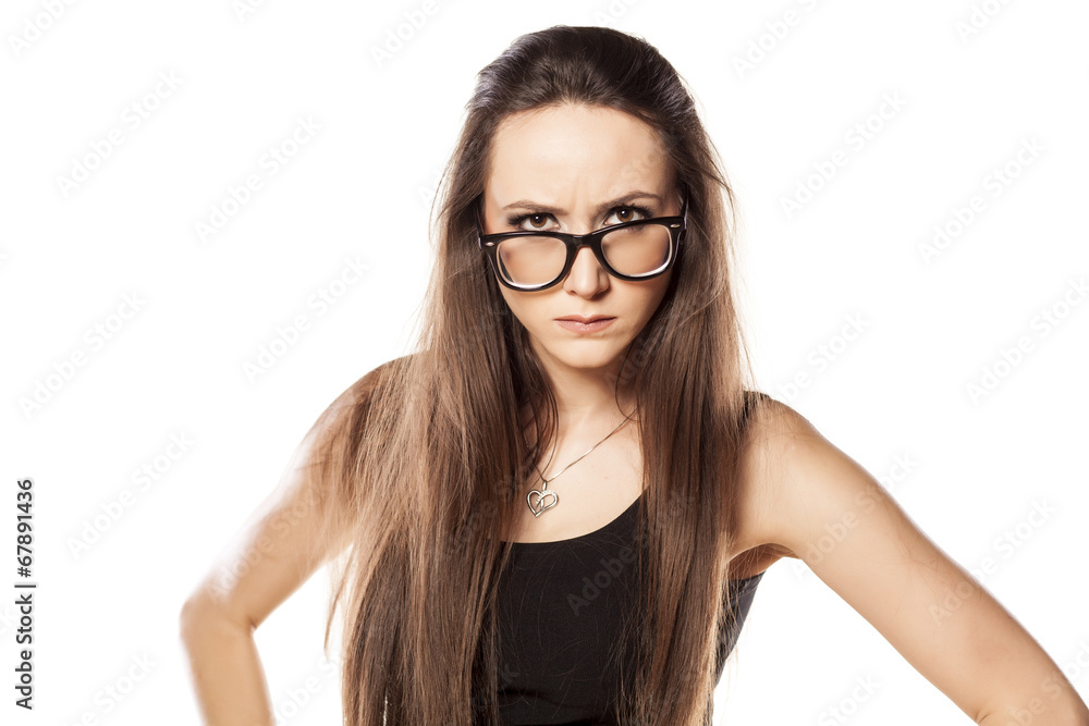 suspicious angry young woman on white background suspicious angry young woman on white background