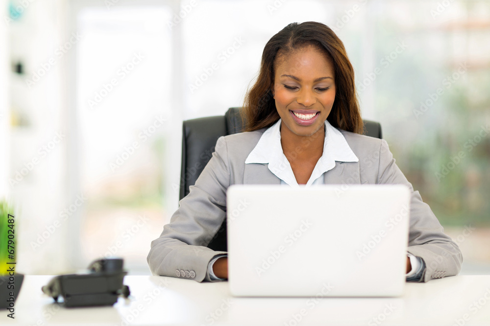 afro american businesswoman using laptop computer afro american businesswoman using laptop computer