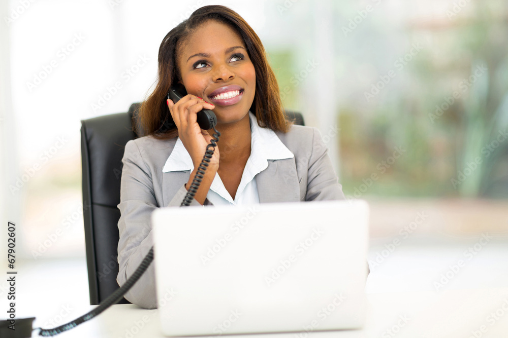 african american businesswoman making phone call african american businesswoman making phone call