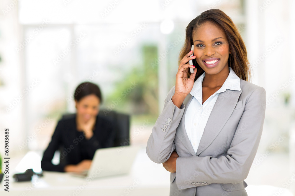 african american businesswoman talking on smart phone african american businesswoman talking on smart phone