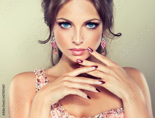 Fashion Beauty Model Girl. Manicure and Make-up