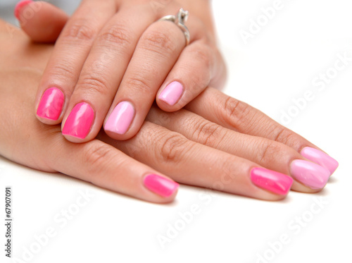 pink manicure isolated on white background