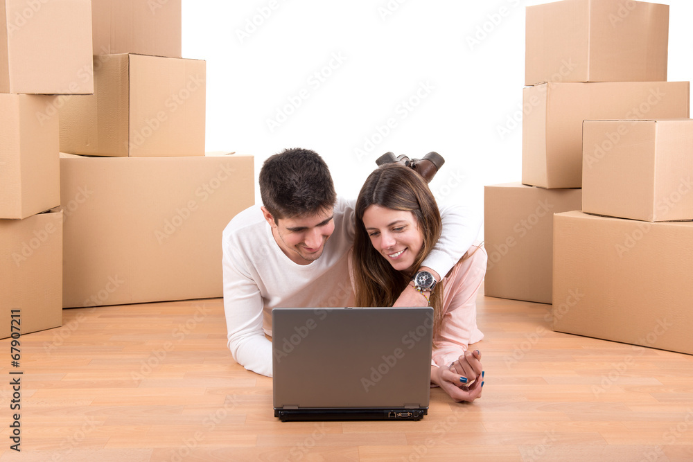Happy couple with boxes Happy couple with boxes