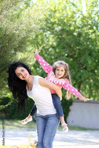 Happy mom and daughter. Wal...