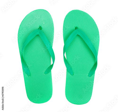 Green flip-flops isolated on white background