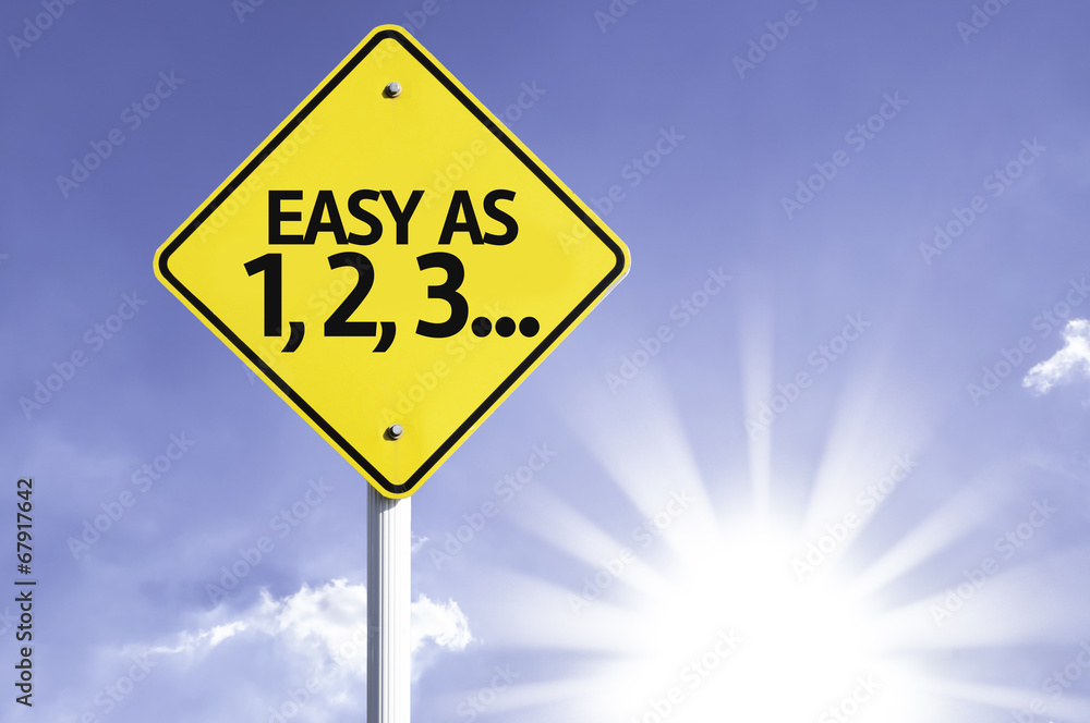 Easy as 1, 2, 3 road sign with sun background