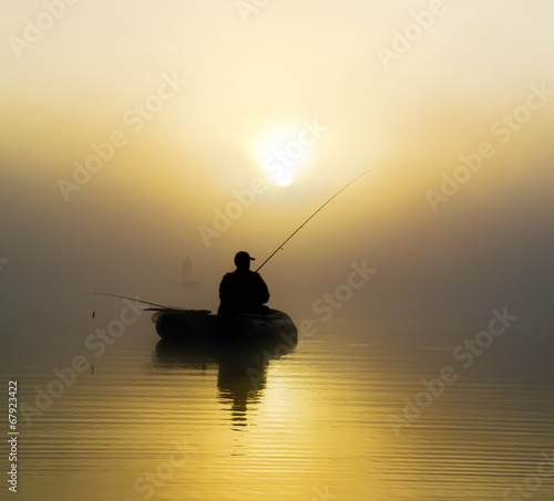 Fishermen in the morning mist