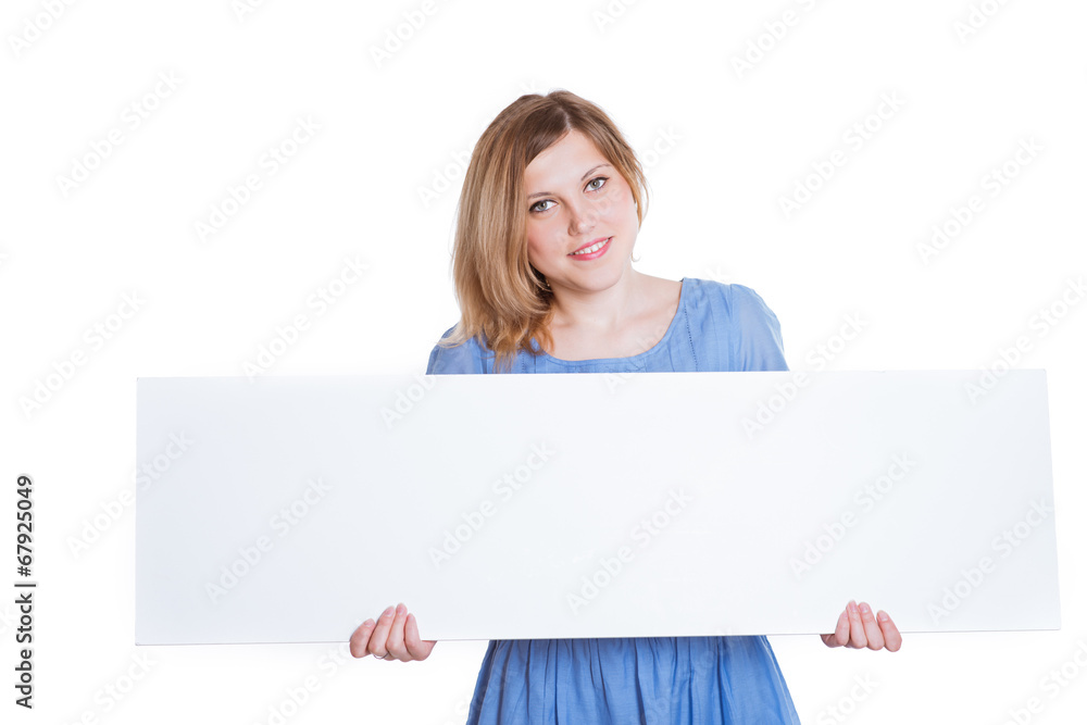 Portrait of a cheerful young brunette woman holding a white blan Portrait of a cheerful young brunette woman holding a white blan