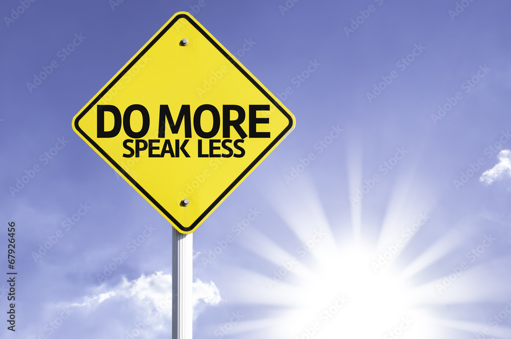 Do More, Speak Less road sign with sun background Do More, Speak Less road sign with sun background