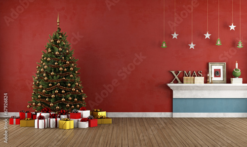 Old red room with christmas tree