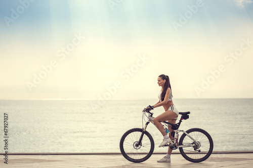 Image of a beautiful girl on the bike