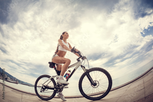 A beautiful girl on the bike