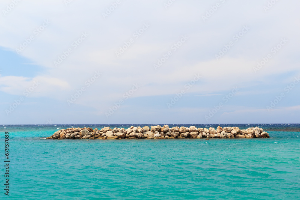 Background  sea blue sky white clouds breakwater