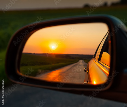 Reflection in the Mirror of the Car and the Sunset. Landscape Rural Orange Evening Highway Roadside Auto