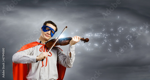 Superman playing violin