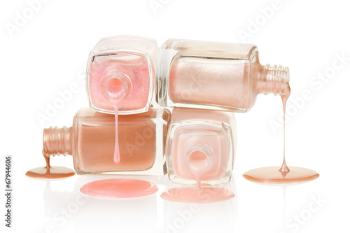 Pink nail polish spilled on white, clipping path