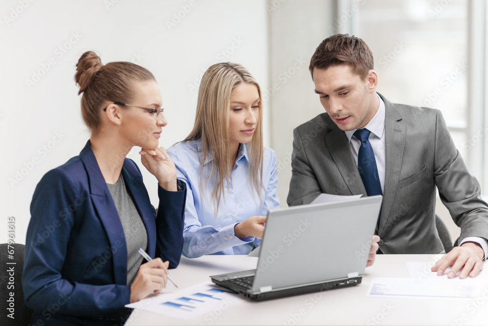 business team with laptop having discussion business team with laptop having discussion