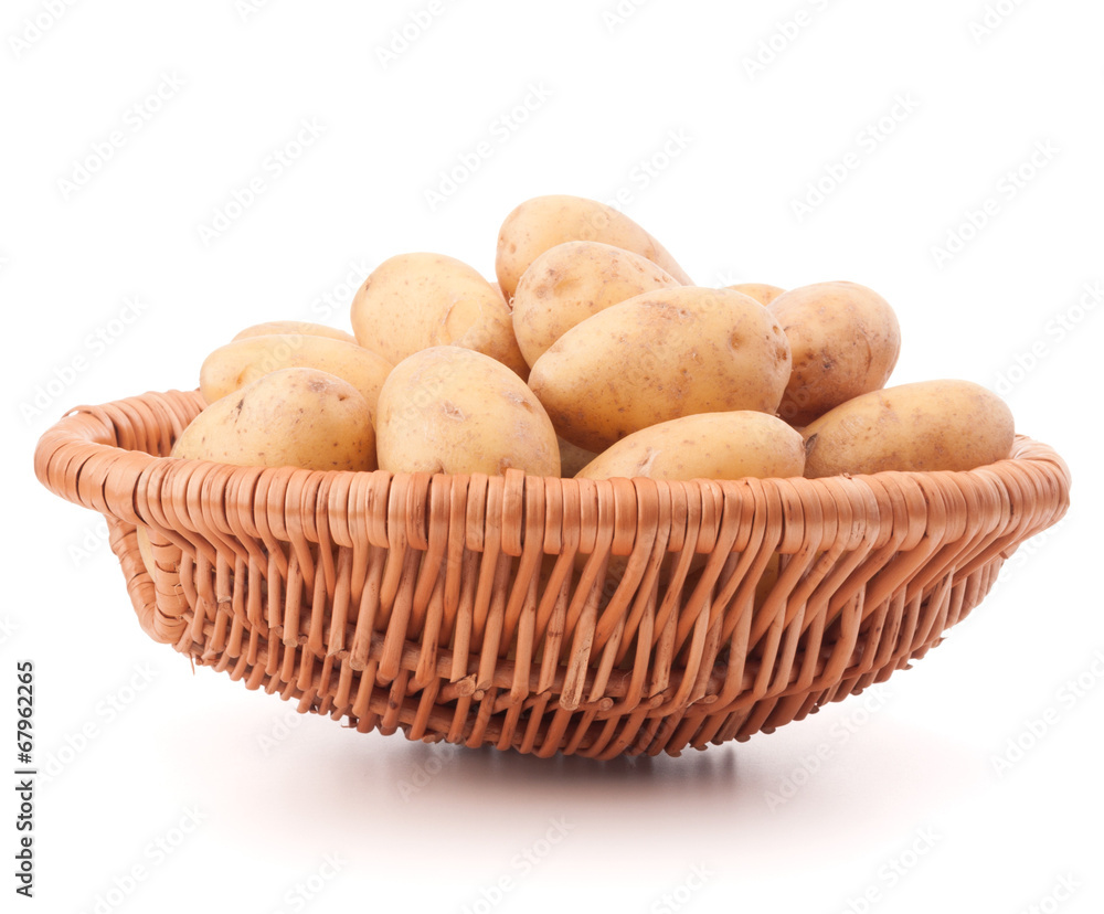 Potato tuber in wicker basket isolated on white background Potato tuber in wicker basket isolated on white background