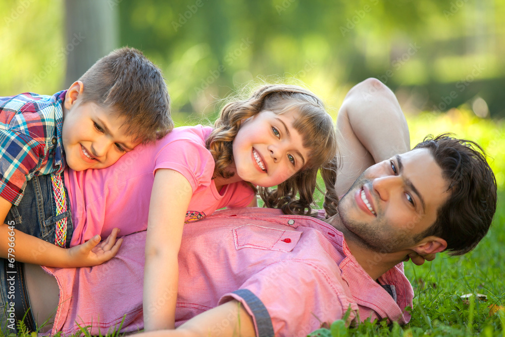 Daddy carrying children