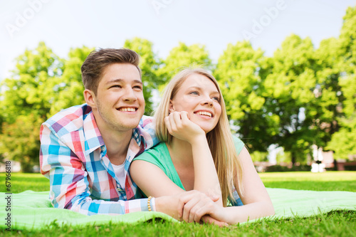 smiling couple in park