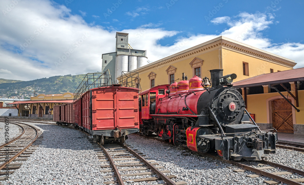 Old locomotive train on a railroad track