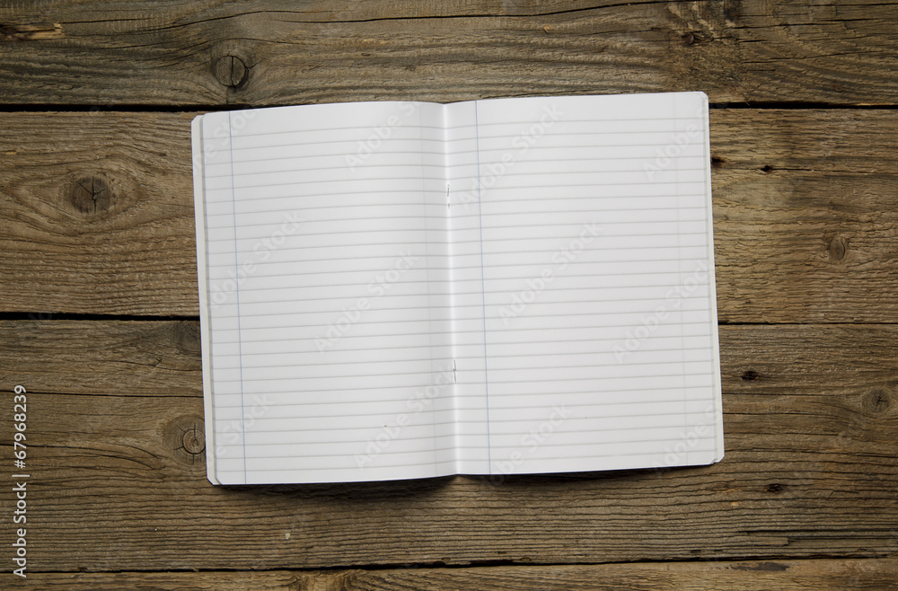 Blank notebook and different school objects Blank notebook and different school objects
