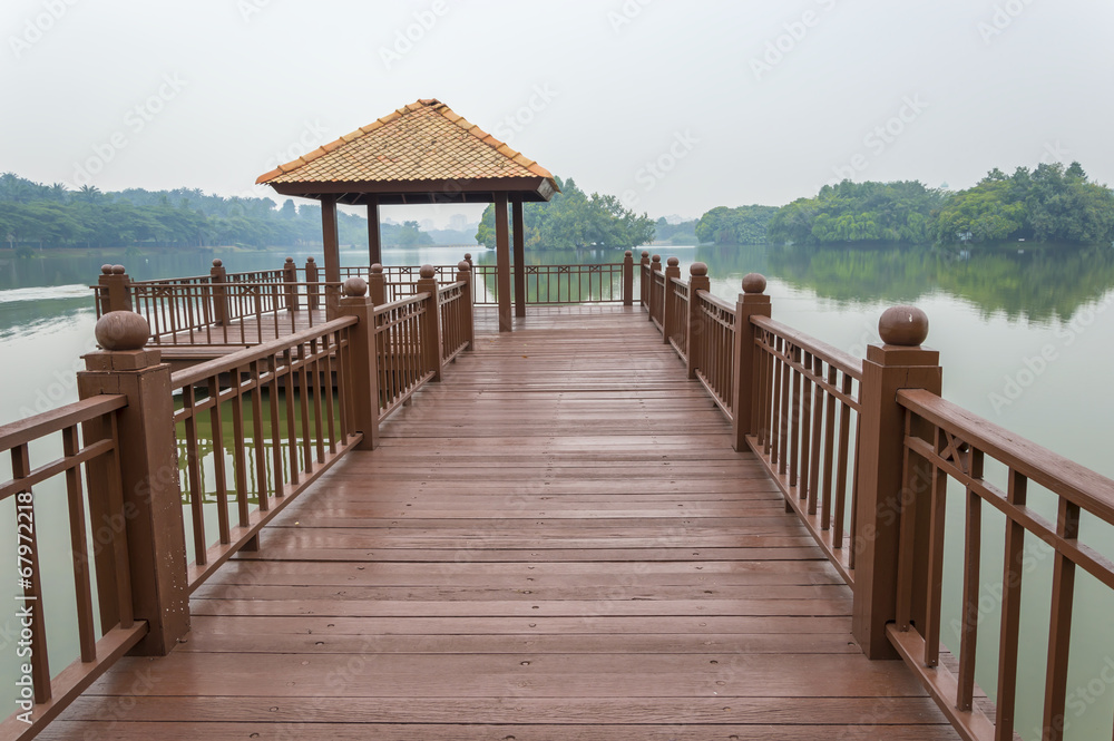 Wooden jetty with morning mist