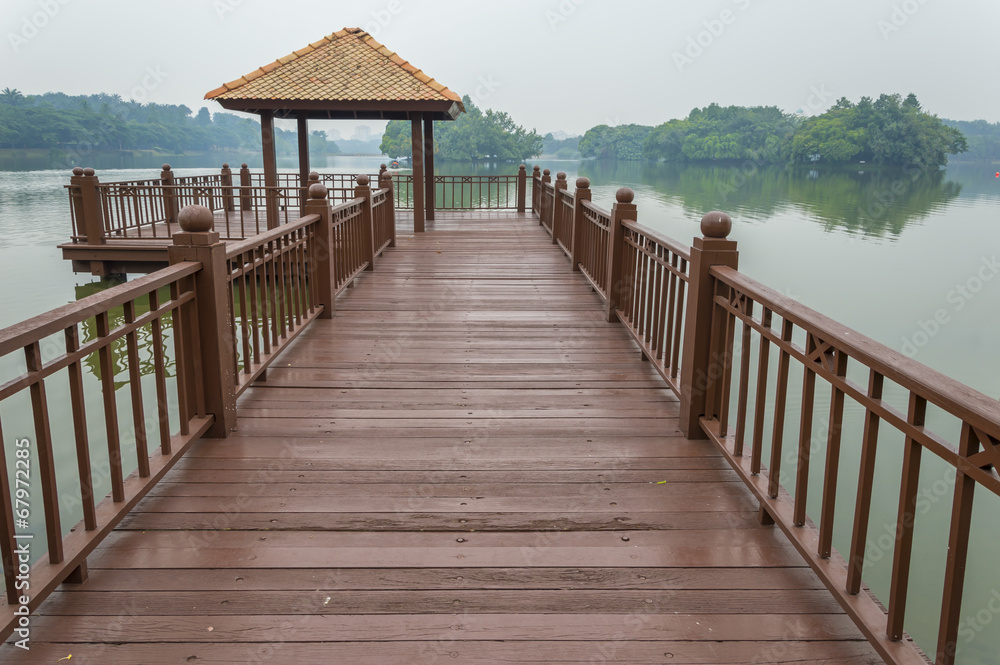 Wooden jetty with morning mist