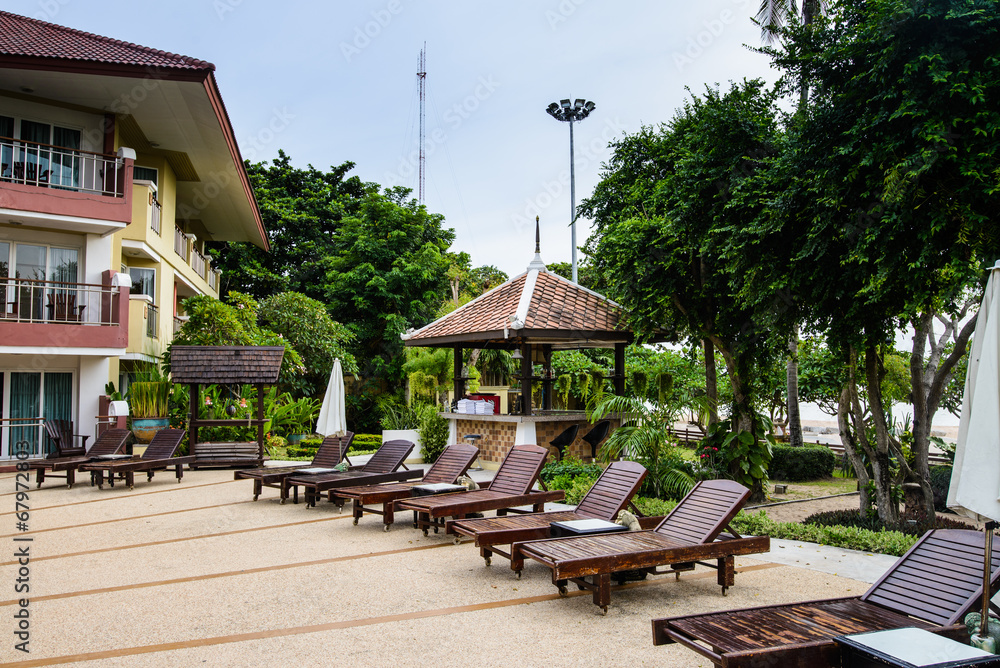Fototapeta premium Deck chairs and Swimming pool