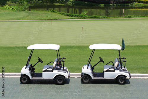 golf car in green golf course