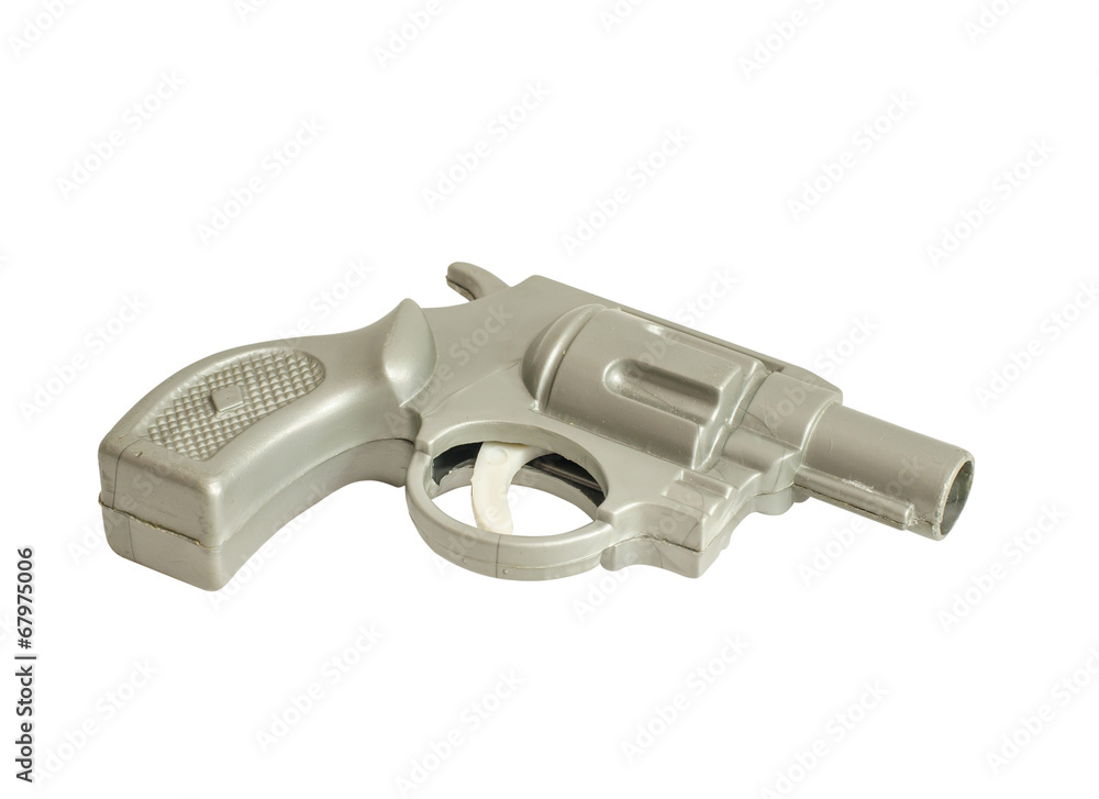 Toy hand gun isolated on the white background