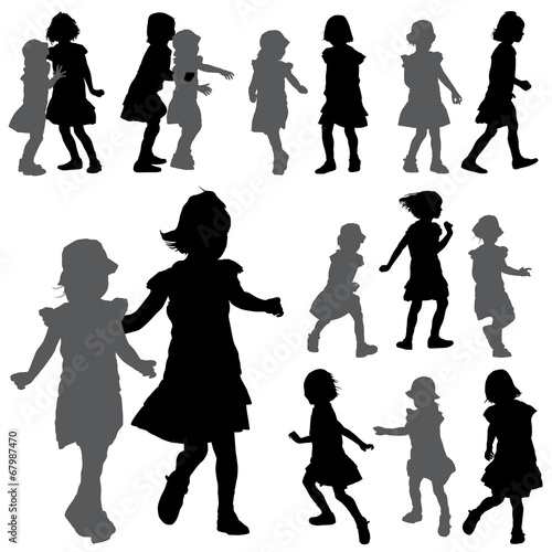 Silhouettes of small girls on the white background