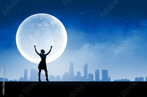 Woman and full moon