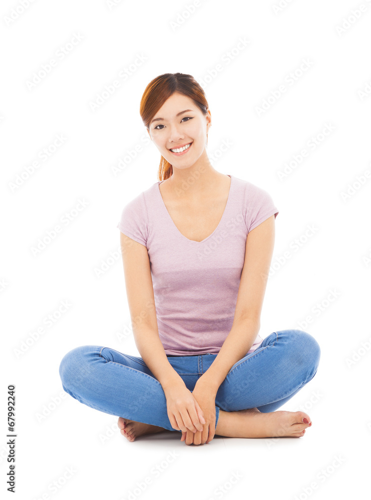 smiling beautiful asian young student sitting on the floor smiling beautiful asian young student sitting on the floor