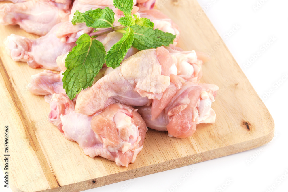 Chicken wing meat on chop board Chicken wing meat on chop board