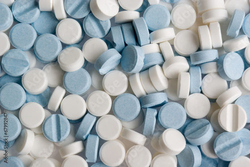Blue and white pills background