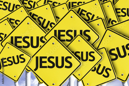 Jesus written on multiple road sign