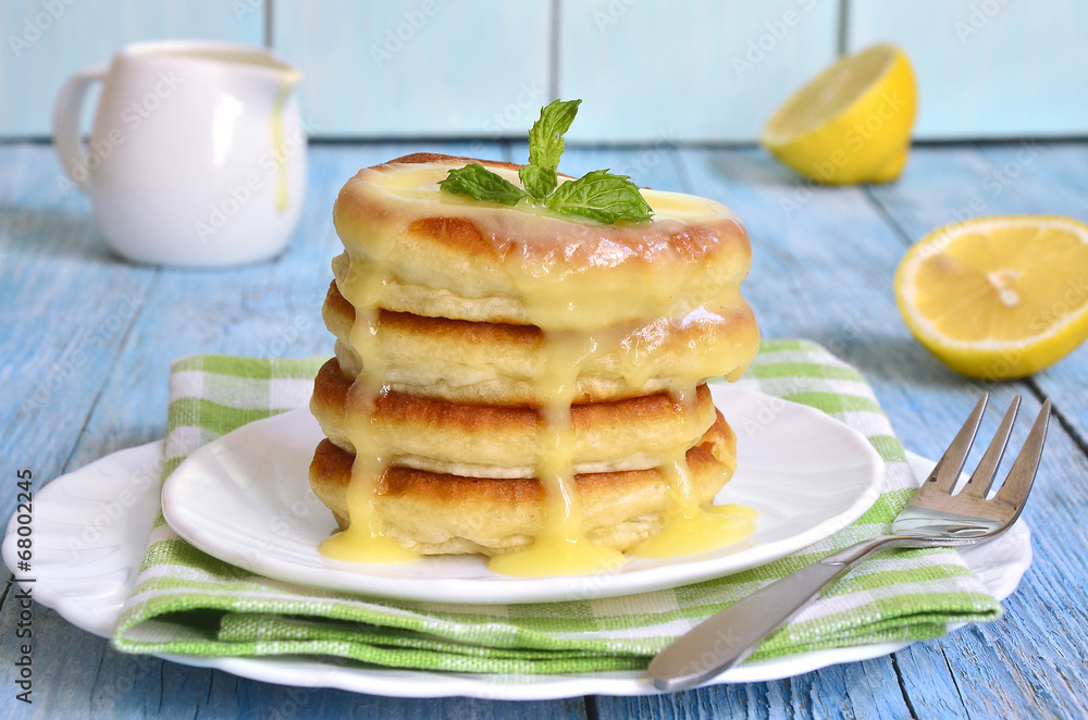 Pancakes with lemon sauce.