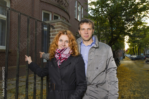 Outdoor happy couple in love,autumn Amsterdam background