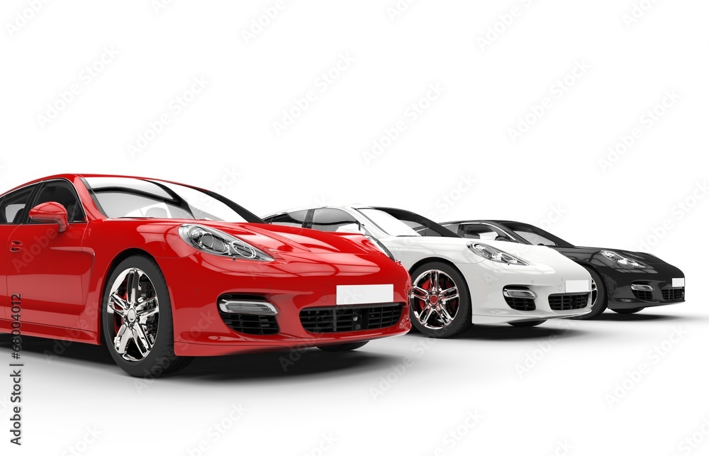 Three modern fast cars in a row, side angle view