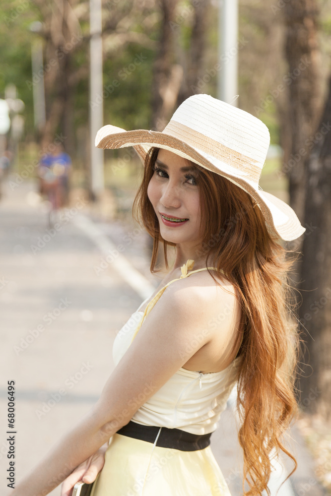 Portrait Asian woman wearing hat