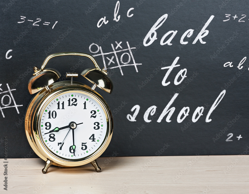 alarm clock on a background of chalkboard alarm clock on a background of chalkboard