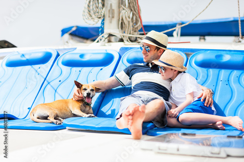 Family sailing on a luxury yacht photo